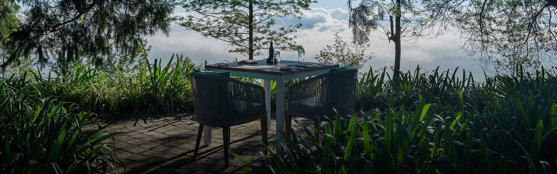 Goatfell offers romantic getaways in Nuwara Eliya, featuring stunning mountain views and a perfect seating area for couples.