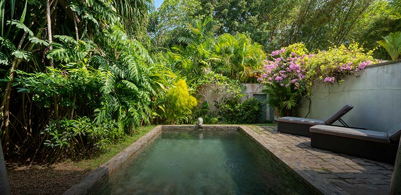Walawwa, a hotel with plunge pool in Sri Lanka, offers suites with private garden, comfy living areas, and peaceful atmospheres.
